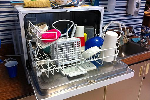 Image of an open dishwasher